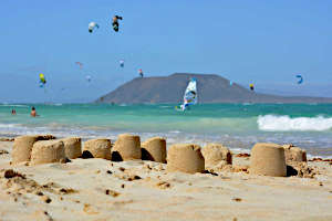 Sandcastles and kite surfers