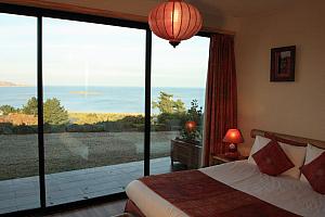 Double room with full height window and terrace