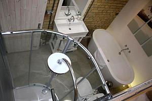 Bathroom with shower and bath