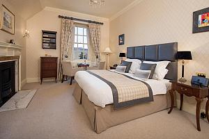 Large double bedroom with fireplace