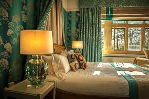 Big drapes over the bed