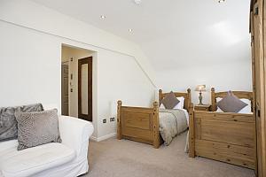 Twin beds and sitting area