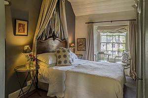 Drapes above the bed