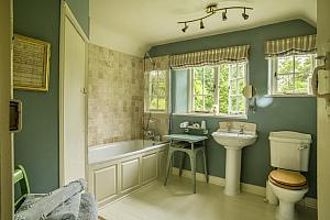 Bathroom with bath and shower