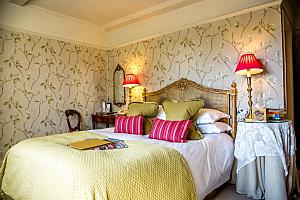 Carved wooden bed-head