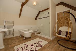 Big bathroom with exposed beams