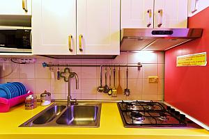 Kitchen with hob, microwave, sink