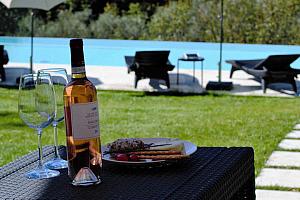 Wine and snacks near the pool