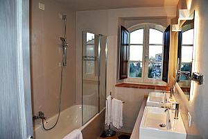 Bathroom with bath and shower