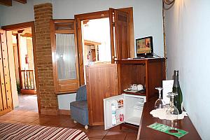 Room with fridge and tea-making