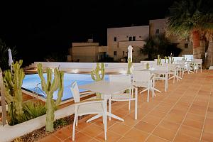 Tables on the pool terrace