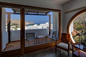 Room with sea and country view