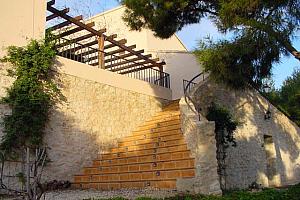 Steps to the garden and pool