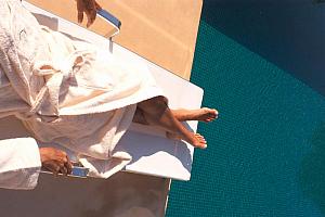 Relaxing by the pool